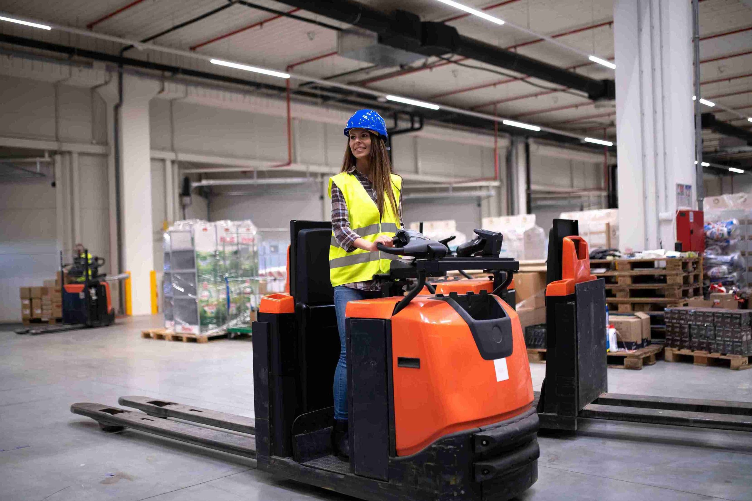 girl on mini forklift